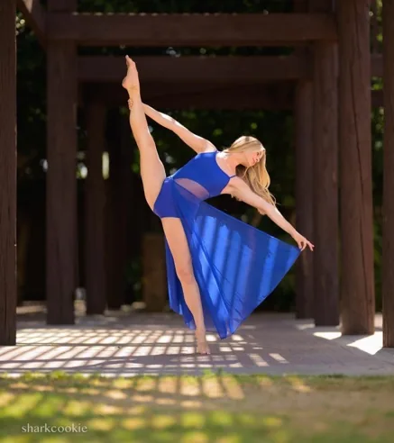 Lindsey dancing in a blue dress